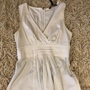 BCBG White, v-neck pleated, sleeveless blouse